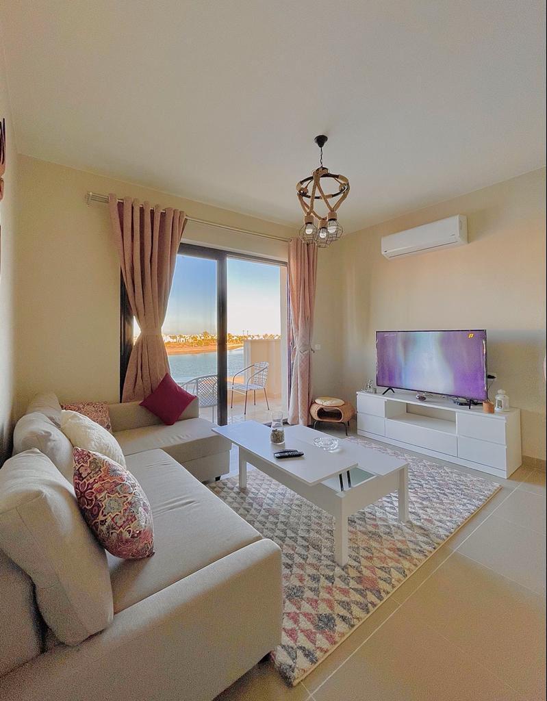 Cyan Lagoon View Retreat | 2BR with Pool Access — Living Room in Cyan Elgouna, Red Sea, Egypt — photo 2