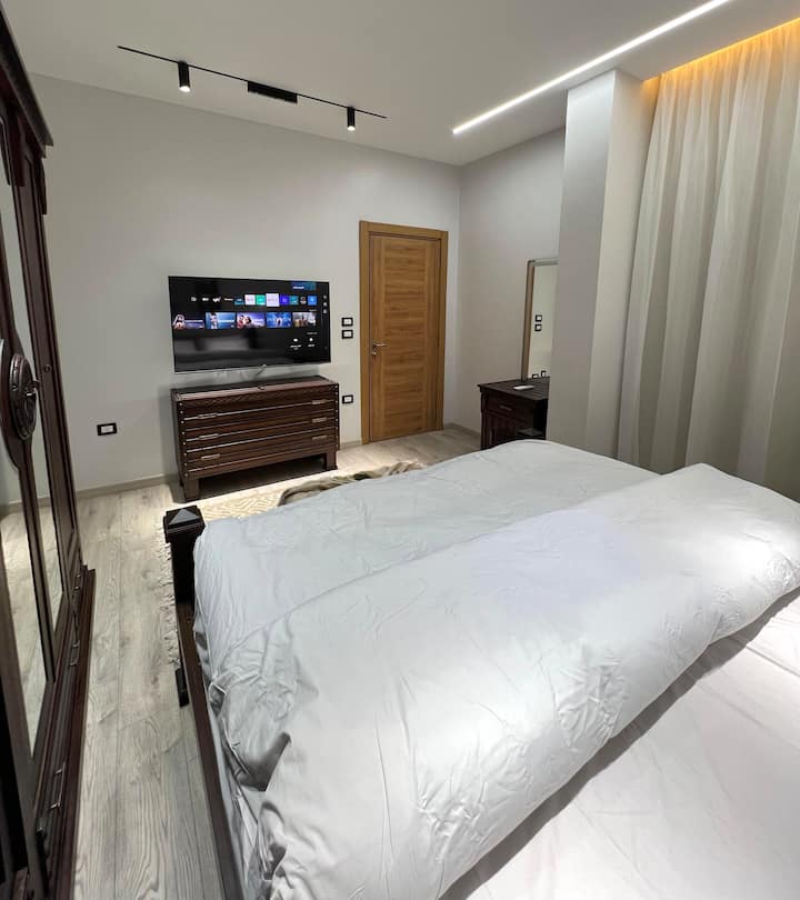 Next to WaterWay Charm Near Mall and Restaurants — Bedroom 1 in Next to WaterWay, New Cairo, Egypt, Egypt — photo 2