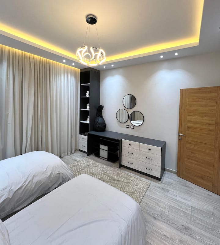 Next to WaterWay Charm Near Mall and Restaurants — Bedroom 2 in Next to WaterWay, New Cairo, Egypt, Egypt — photo 2
