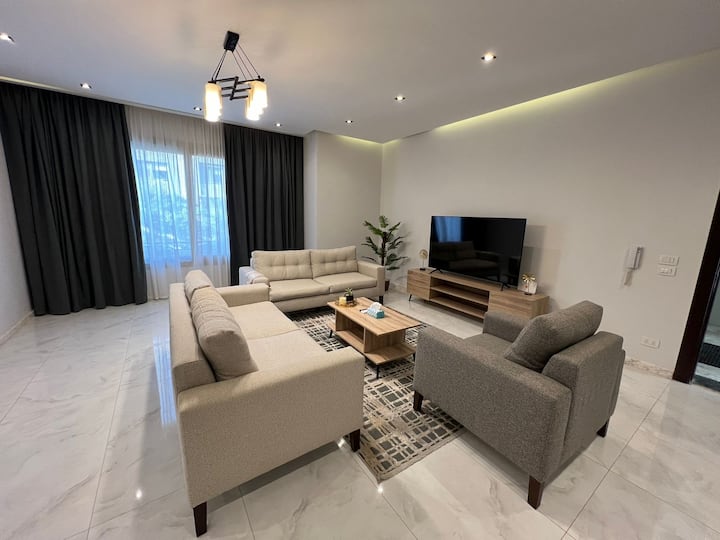 Designer Finish Prestigious AUC Palm Hills VG 2Bed — Living Room in AUC Palm Hills VG, New Cairo, Egypt, Egypt — photo 2