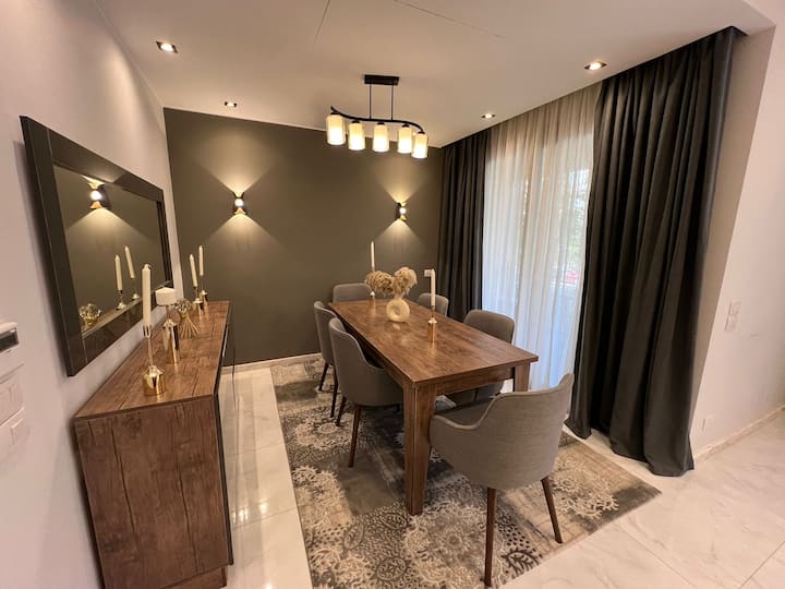 Designer Finish Prestigious AUC Palm Hills VG 2Bed — Dining Area in AUC Palm Hills VG, New Cairo, Egypt, Egypt