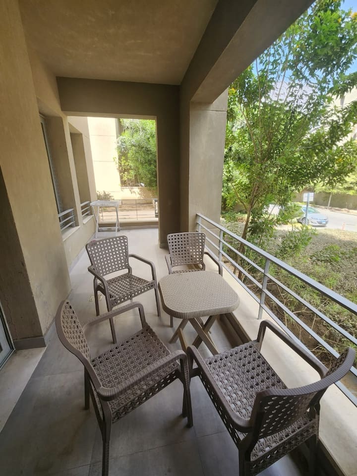 Designer Finish Prestigious AUC Palm Hills VG 2Bed — Balcony in AUC Palm Hills VG, New Cairo, Egypt, Egypt