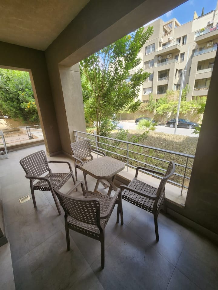 Designer Finish Prestigious AUC Palm Hills VG 2Bed — Balcony in AUC Palm Hills VG, New Cairo, Egypt, Egypt — photo 2