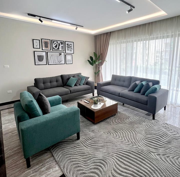 Elegant Servcd 2-Bed W/ Large Terrace — Living Room in Lakeview Residence, New Cairo, Egypt, Egypt