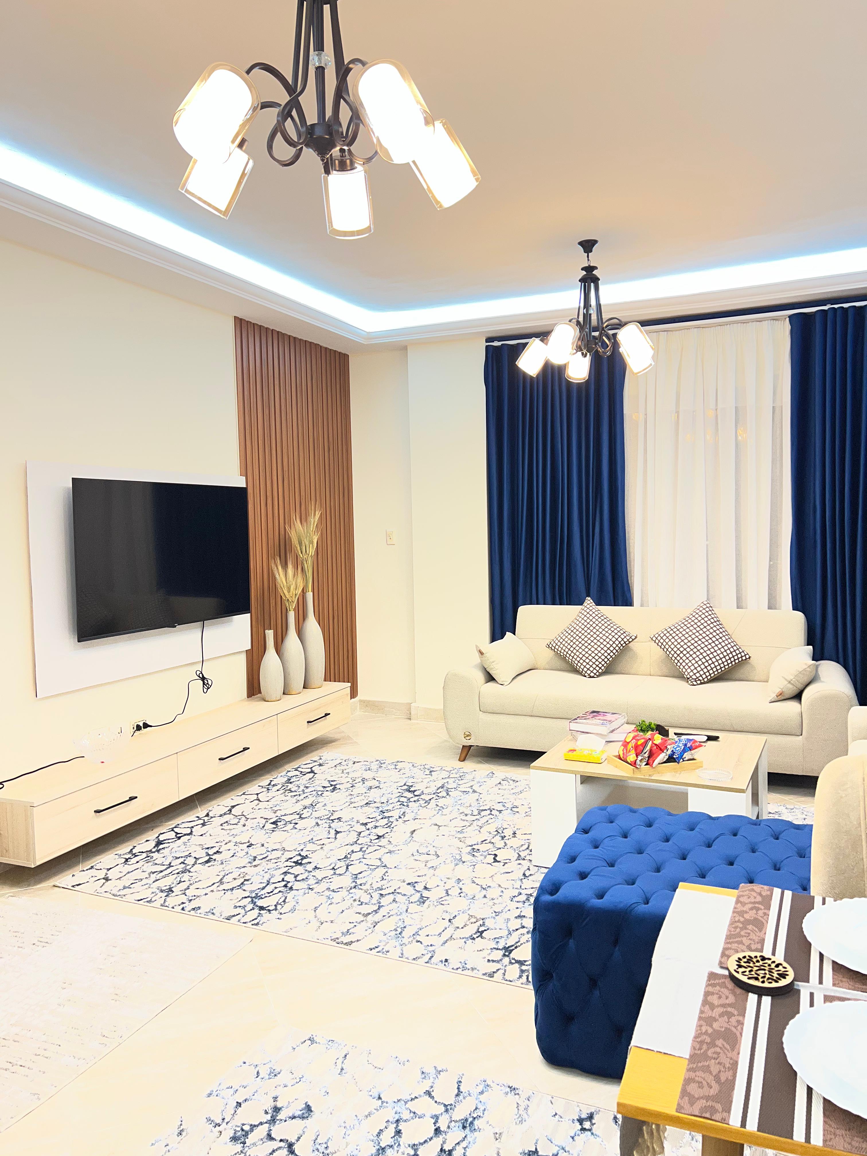 Modern Luxury 2-bedroom Apartment in New Cairo — Living Room in dar masr kornfel bulding 410, Egypt