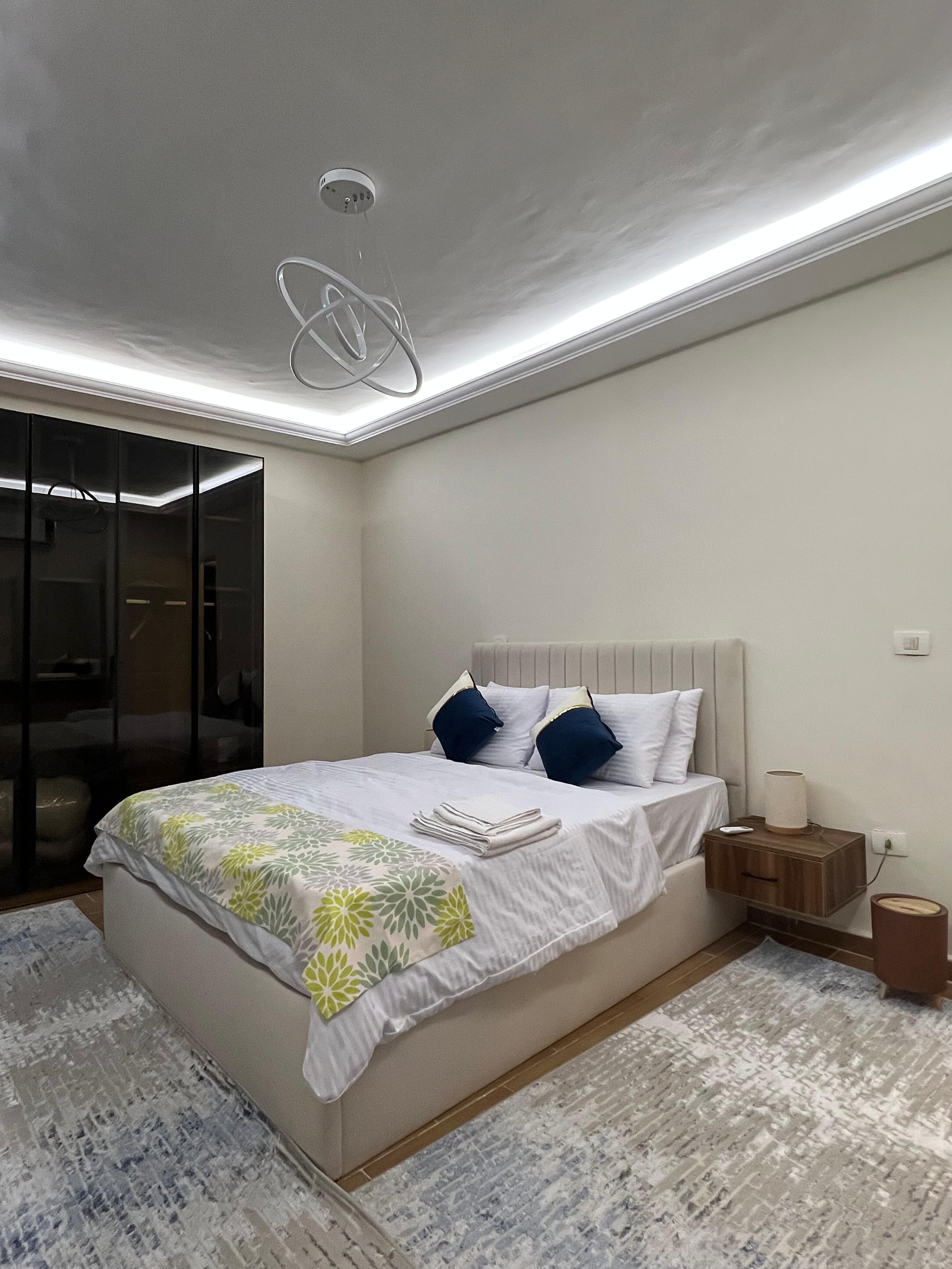 Modern Luxury 2-bedroom Apartment in New Cairo — Bedroom 1 in dar masr kornfel bulding 410, Egypt