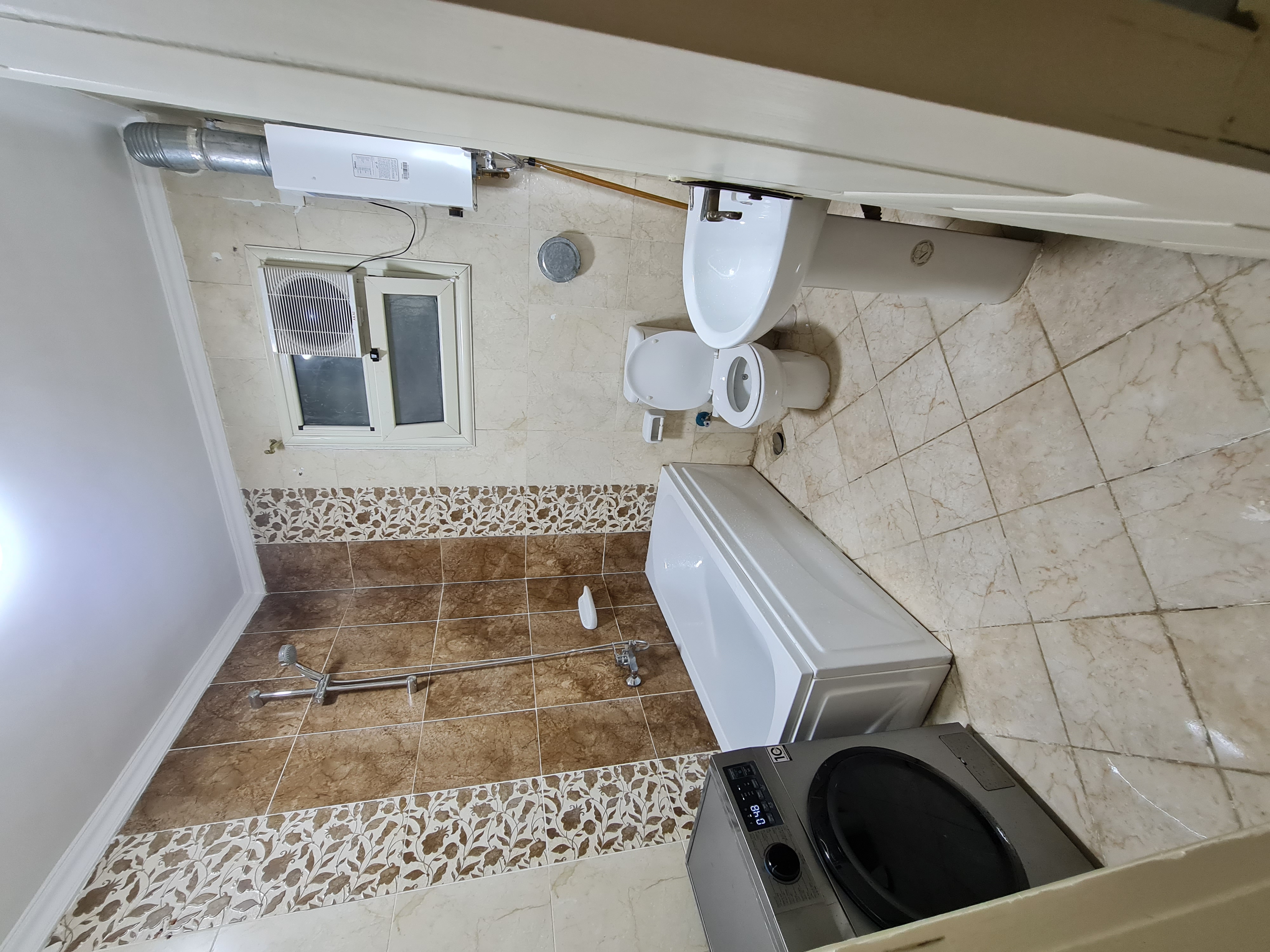 Modern Luxury 2-bedroom Apartment in New Cairo — Full bathroom 1 in dar masr kornfel bulding 410, Egypt