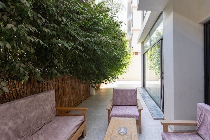 Cozy 2BR Apartment with Private Outdoor | Lakeview — Backyard in New Cairo, Egypt — photo 3