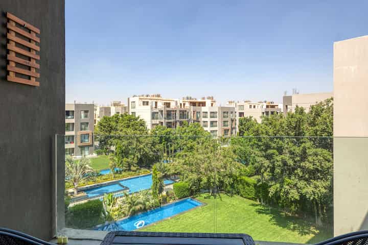 Elegant Garden & Pool View 2-BR Apt | Silverpalm — Balcony in Located in the heart of New Cairo City, Cairo Governorate, Egypt, Egypt — photo 2