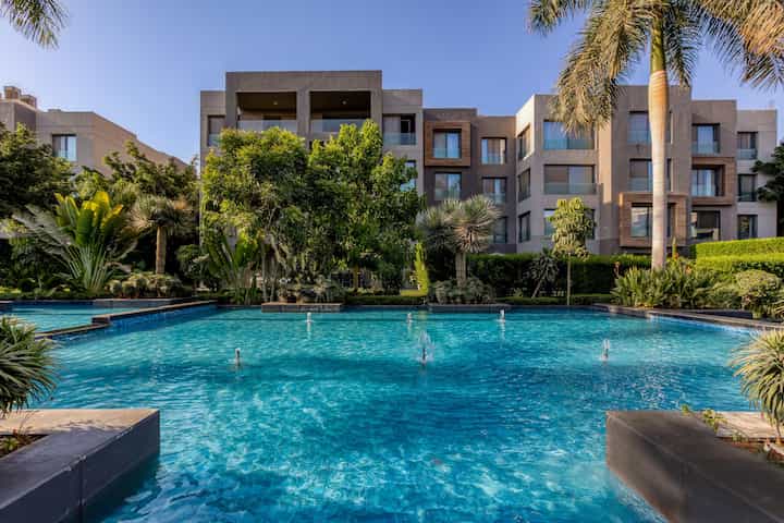 Elegant Garden & Pool View 2-BR Apt | Silverpalm — Pool in Located in the heart of New Cairo City, Cairo Governorate, Egypt, Egypt — photo 3