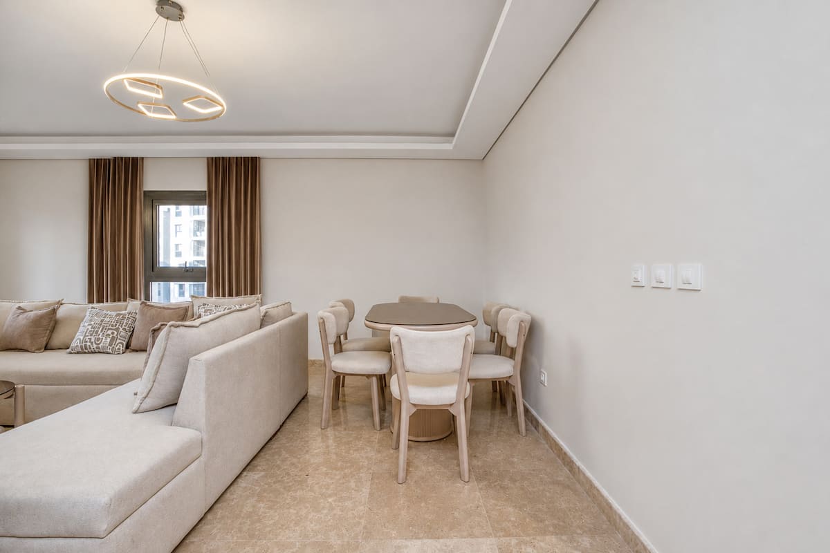 3BR Luxury Apt + Maid Room | Pool Table -Zed West — Dining Area in Zed West | El Sheikh Zayed, Egypt