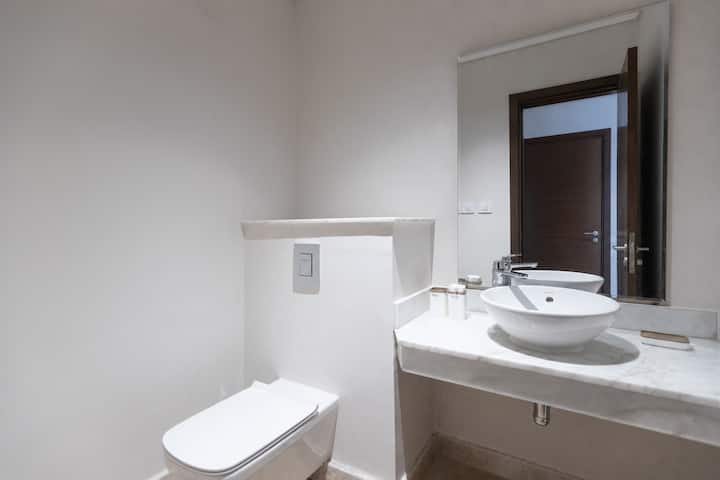 3BR Luxury Apt + Maid Room | Pool Table -Zed West — Half Bathroom 1 in Zed West | El Sheikh Zayed, Egypt
