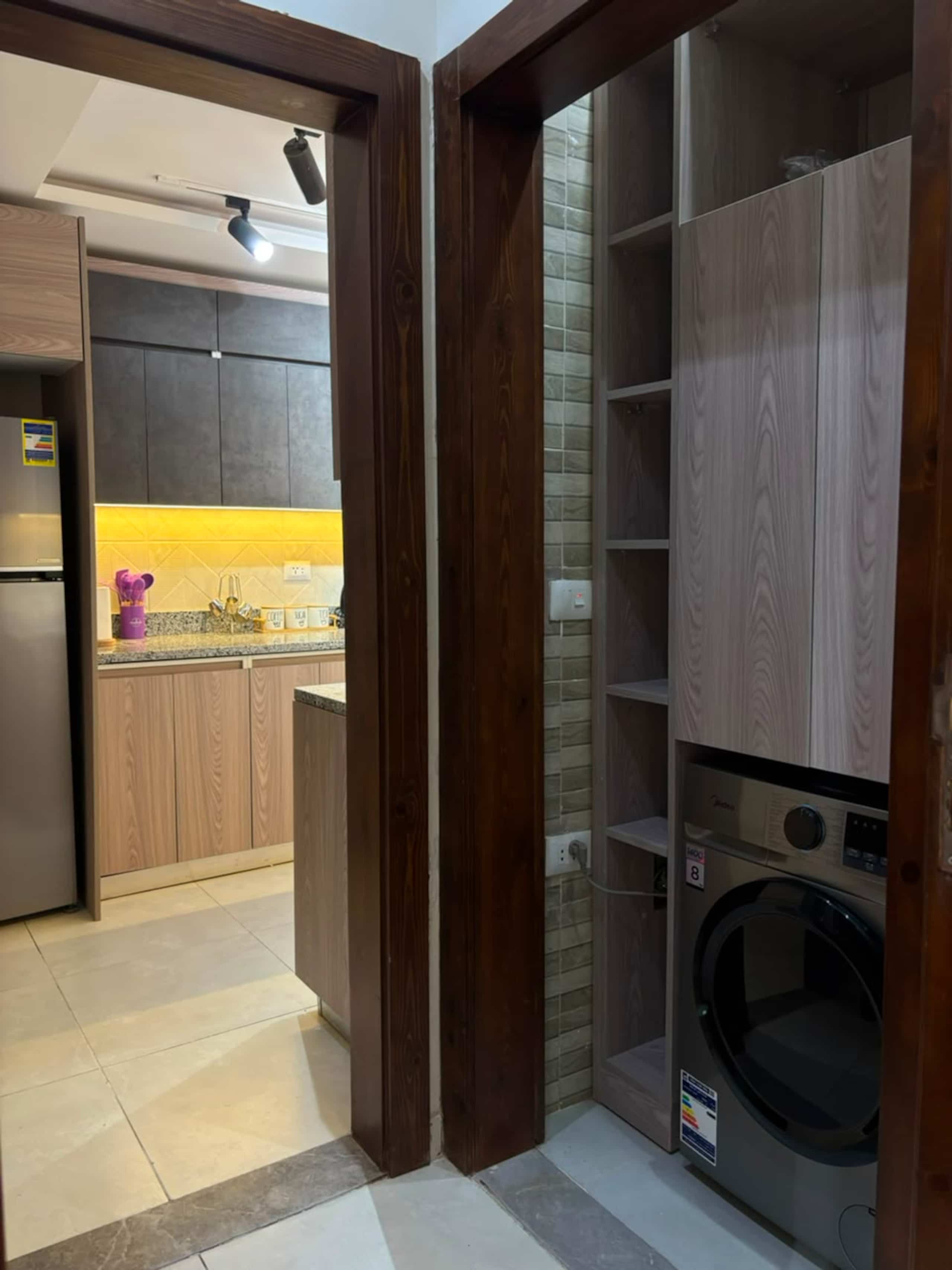 The Lake View Escape | Luxury 3BR | New cairo — Full Kitchen in Cairo, Egypt — photo 3