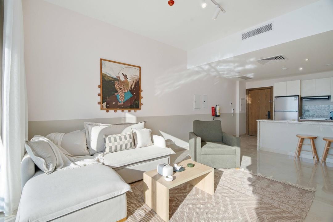 Breezy 1BR Chalet – Sea View – Alamein Towers — Living Room in El Alamen | North Coast, Egypt