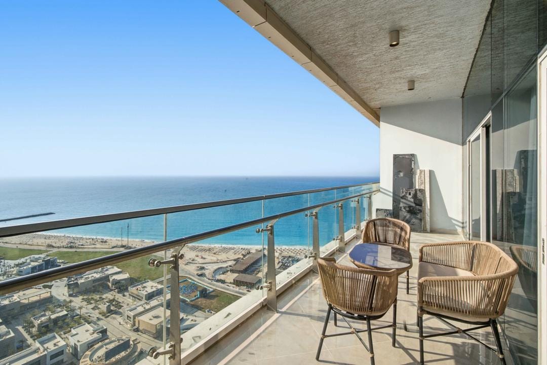 Breezy 1BR Chalet – Sea View – Alamein Towers — Balcony in El Alamen | North Coast, Egypt — photo 2