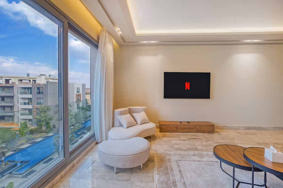 Silver Palm New cairo Luxury 3BR | Pool view — Living Room in New Cairo, Cairo Governorate, Egypt, Egypt — photo 2
