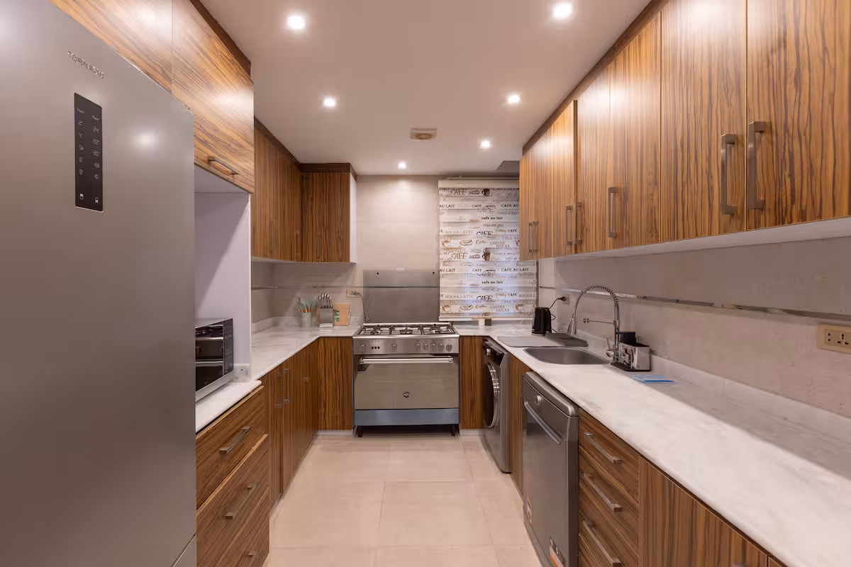 Bright 3BR Apartment | Side Garden View | SP — Full Kitchen in First New Cairo, Egypt