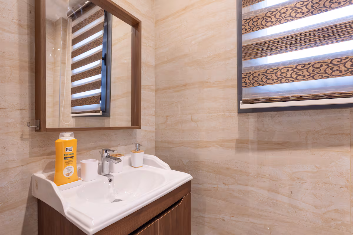 Bright 3BR Apartment | Side Garden View | SP — Half Bathroom 1 in First New Cairo, Egypt