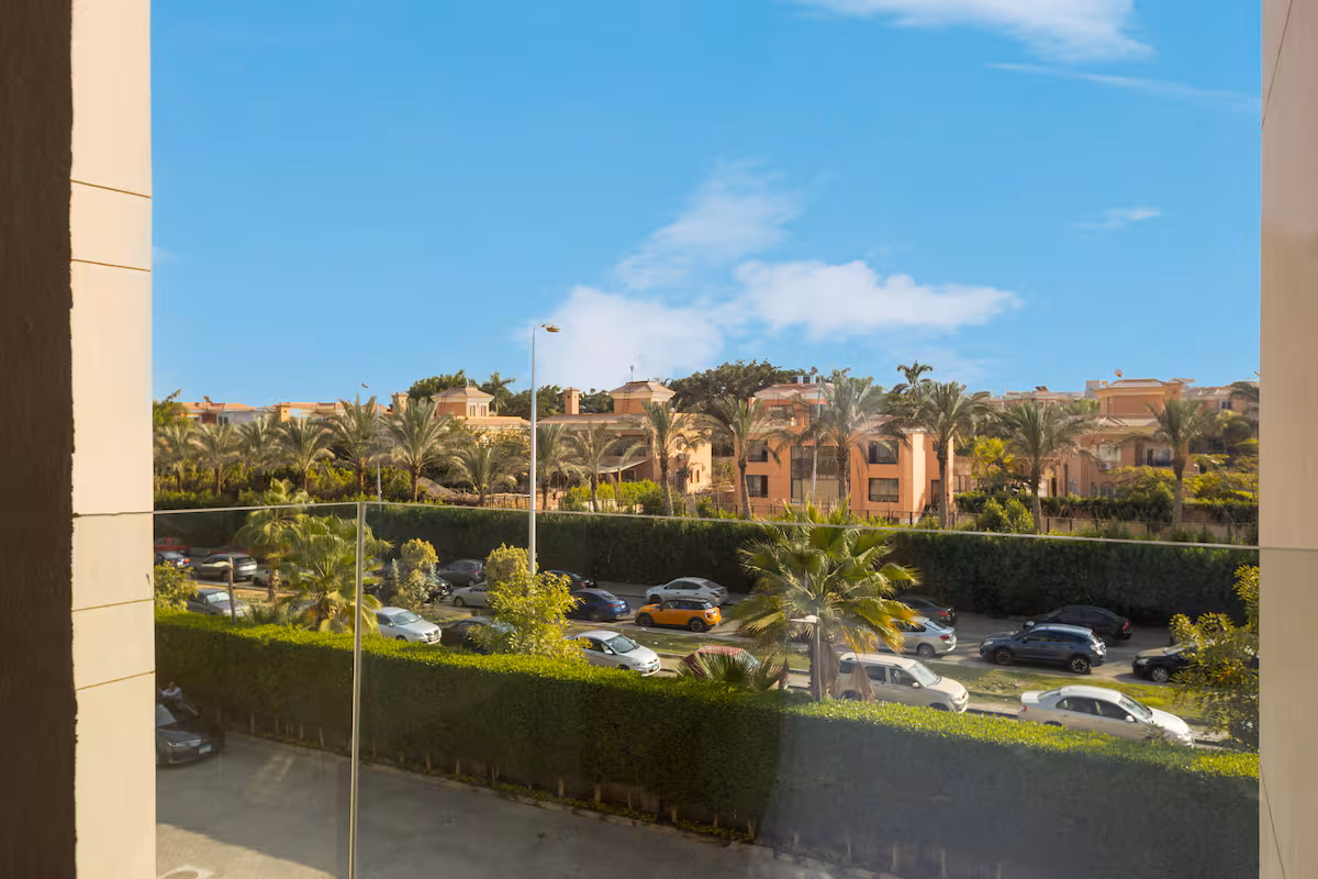 Bright 3BR Apartment | Side Garden View | SP — Balcony in First New Cairo, Egypt