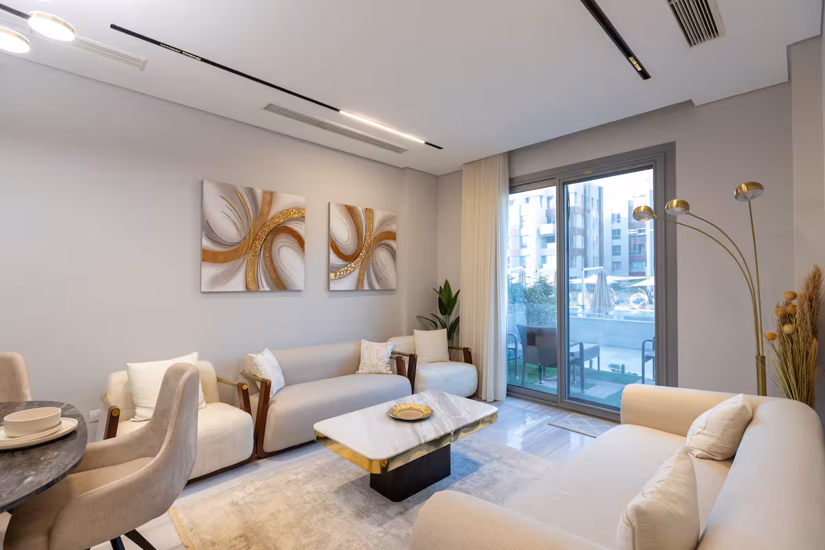 Poolside 3BR | Garden Level | Al-jazi JW Marriott — Living Room in First New Cairo, Egypt — photo 3