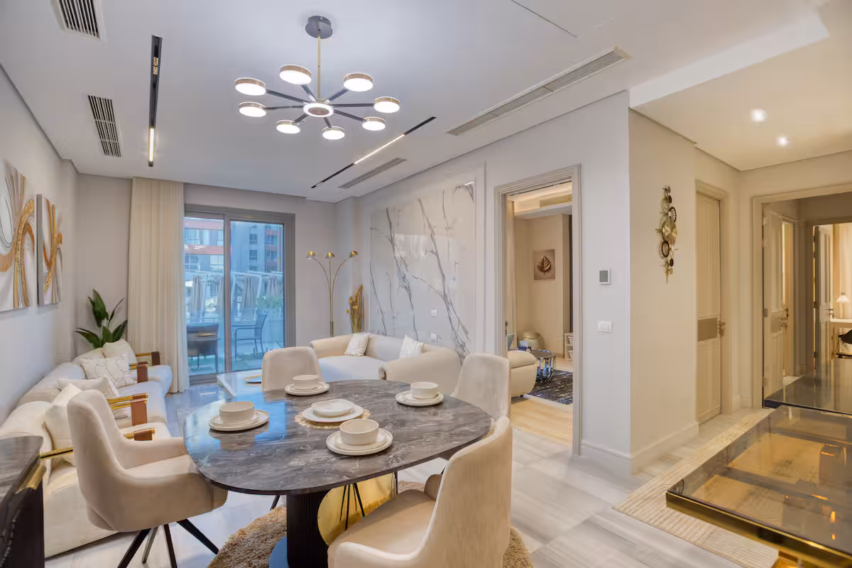 Poolside 3BR | Garden Level | Al-jazi JW Marriott — Dining Area in First New Cairo, Egypt