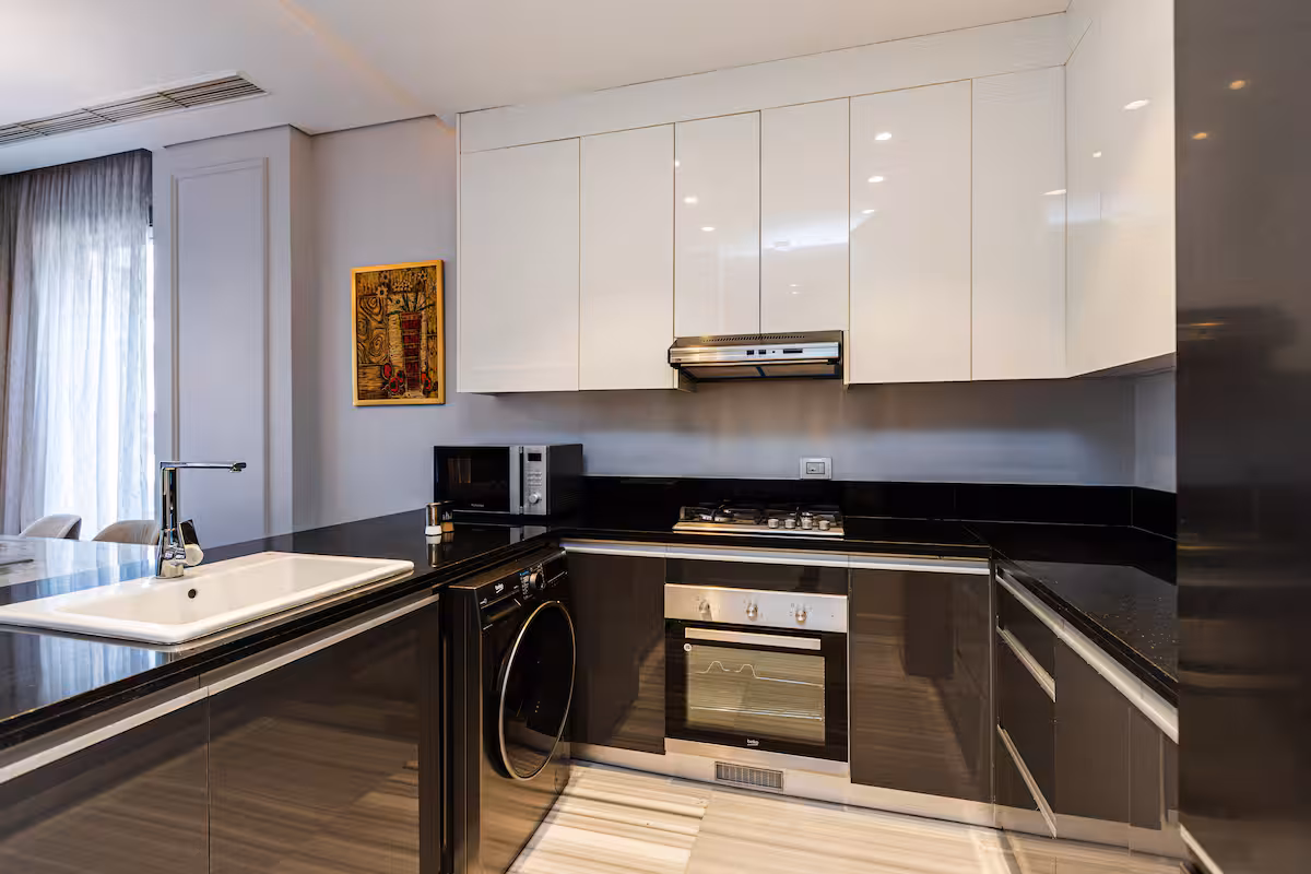 Elegant 2BR Residence | Al Jazi by JW Marriott — Full Kitchen in First New Cairo, Egypt — photo 2