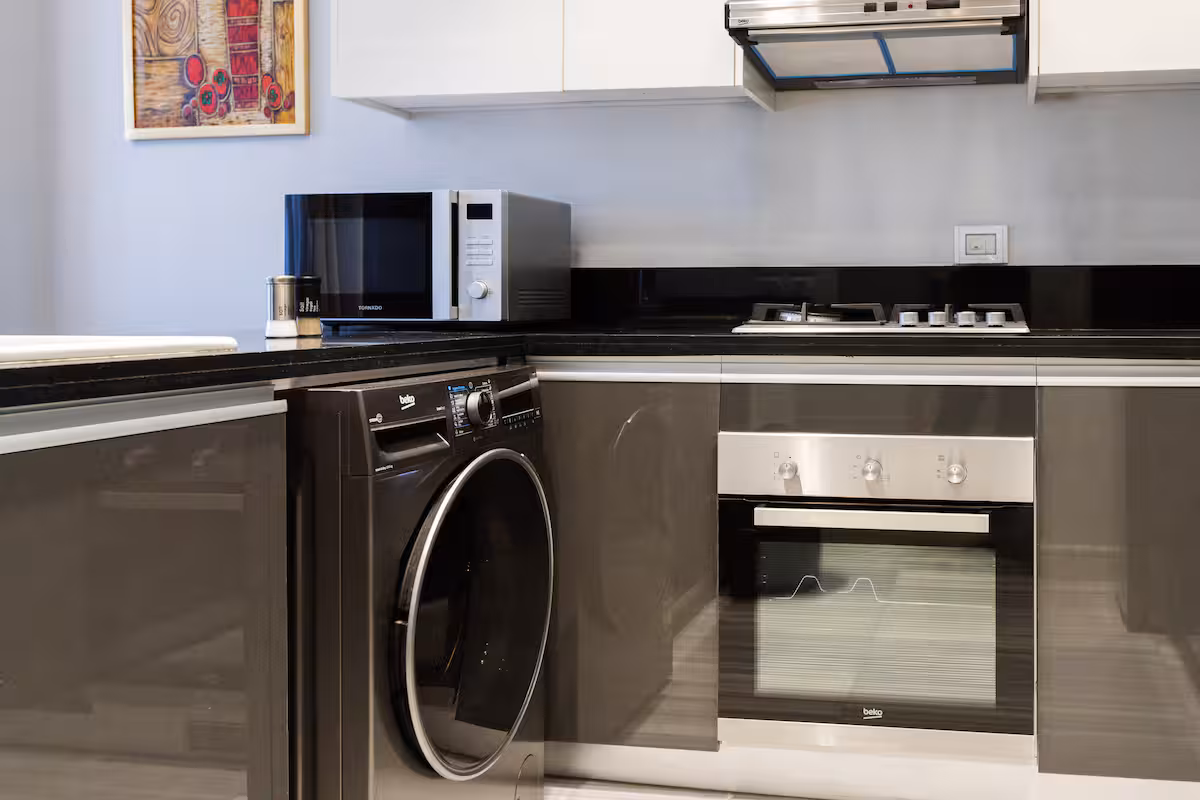 Elegant 2BR Residence | Al Jazi by JW Marriott — Full Kitchen in First New Cairo, Egypt — photo 3