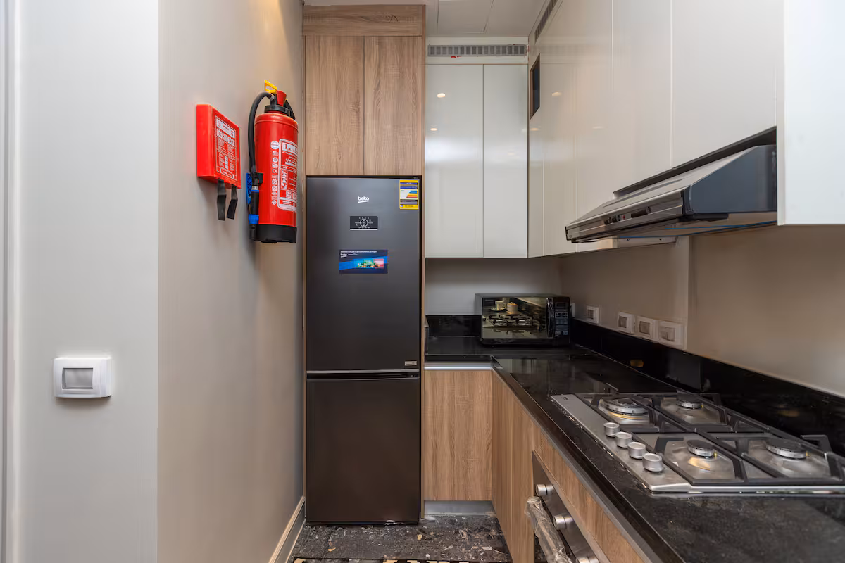 Elegant 1BR Pool View Suite |Aljazi by JW Marriott — Full Kitchen in First New Cairo, Egypt