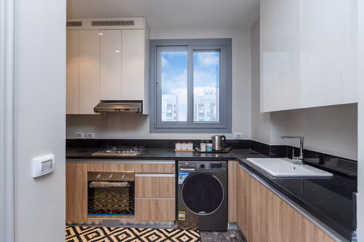 Elegant 1BR Pool View Suite |Aljazi by JW Marriott — Full Kitchen in First New Cairo, Egypt — photo 2