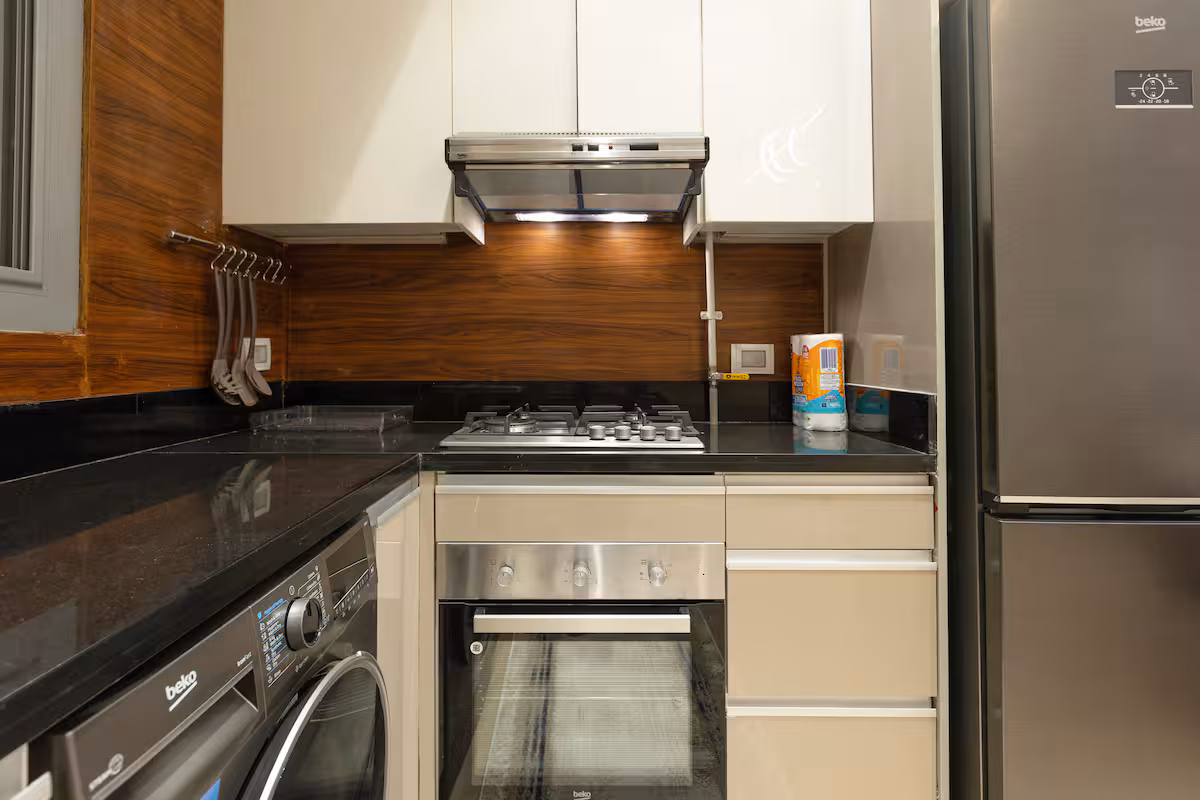 Luxury 1BR Pool View Apt at Al Jazi | JW Marriott — Full Kitchen in New Cairo, Egypt