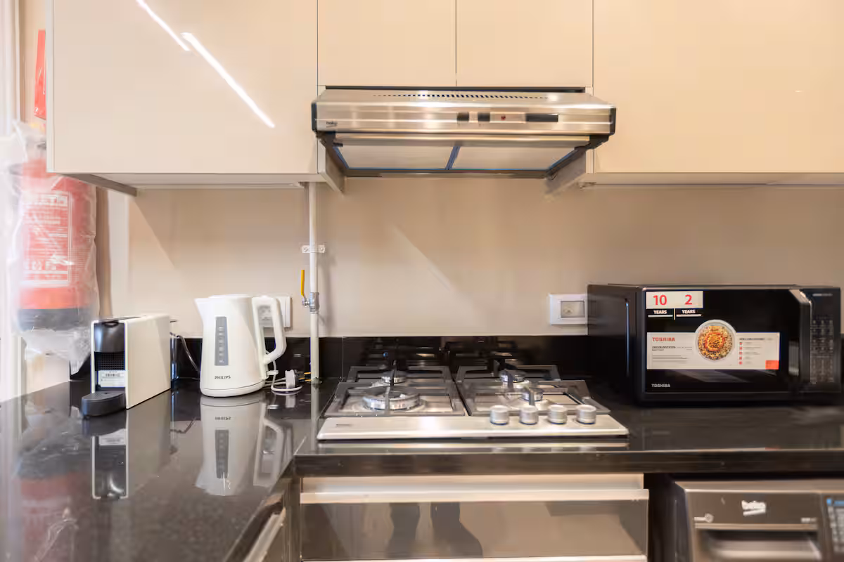Luxury 1BR at JW Marriott Residences | Al Jazi — Full Kitchen in New Cairo, Egypt