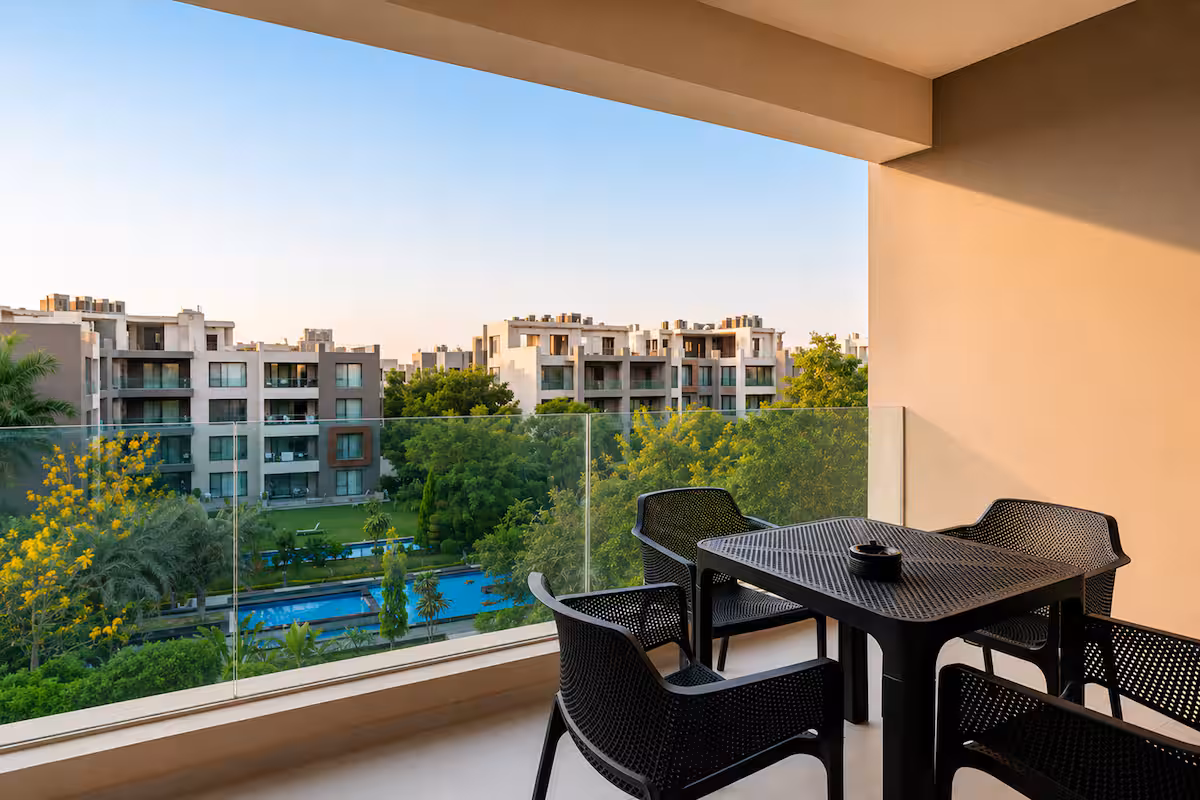 Premium 4BR Stay | Silver Palm | Pool Access — Balcony in New Cairo, Egypt