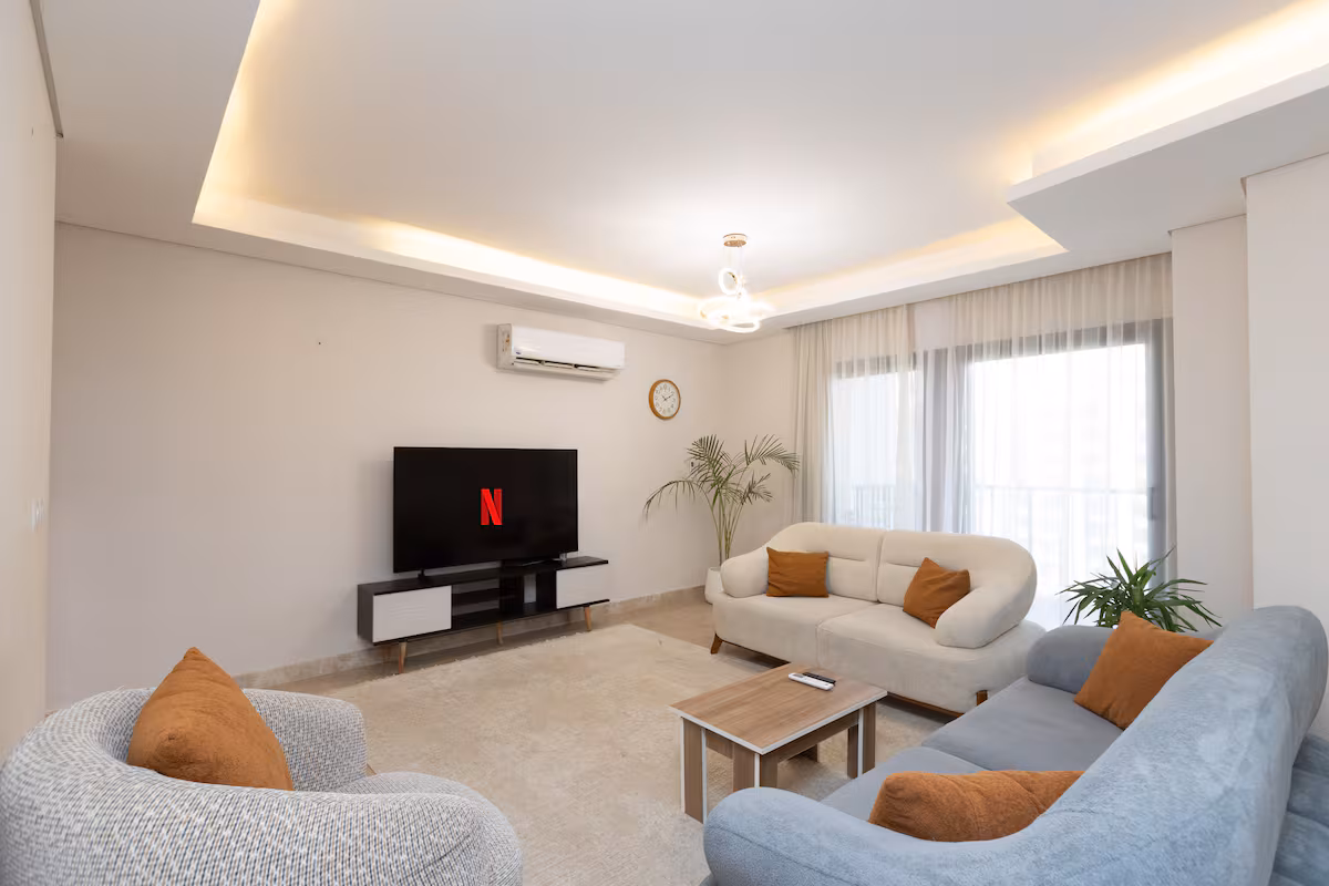 Luxury 3BR Haven Overlooking Green Views -ZED West — Living Room in Sheikh Zayed City, Egypt