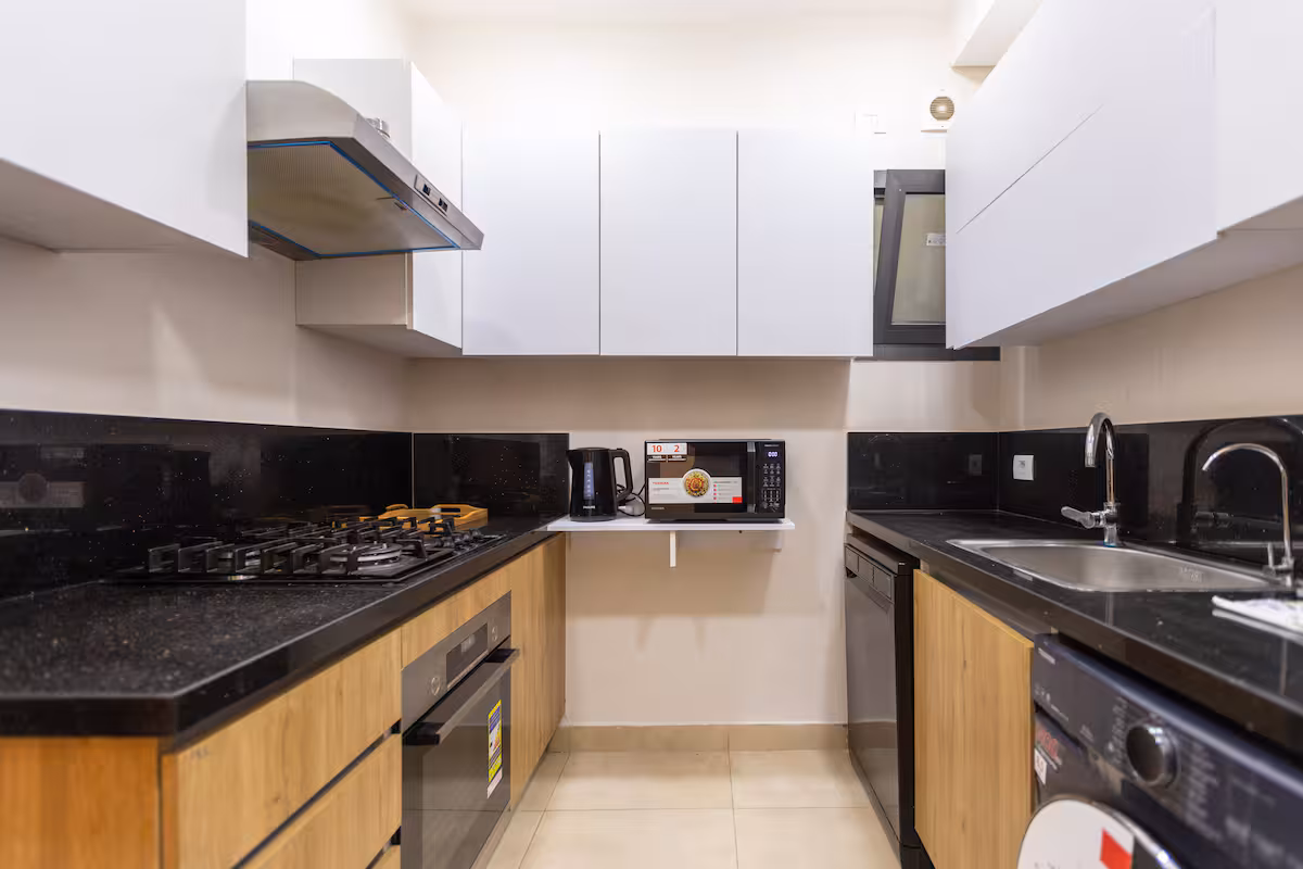 Luxury 3BR Haven Overlooking Green Views -ZED West — Full Kitchen in Sheikh Zayed City, Egypt