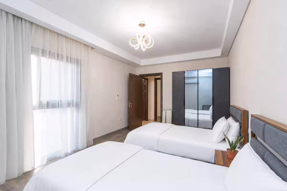 Luxury 3BR Haven Overlooking Green Views -ZED West — Bedroom 2 in Sheikh Zayed City, Egypt