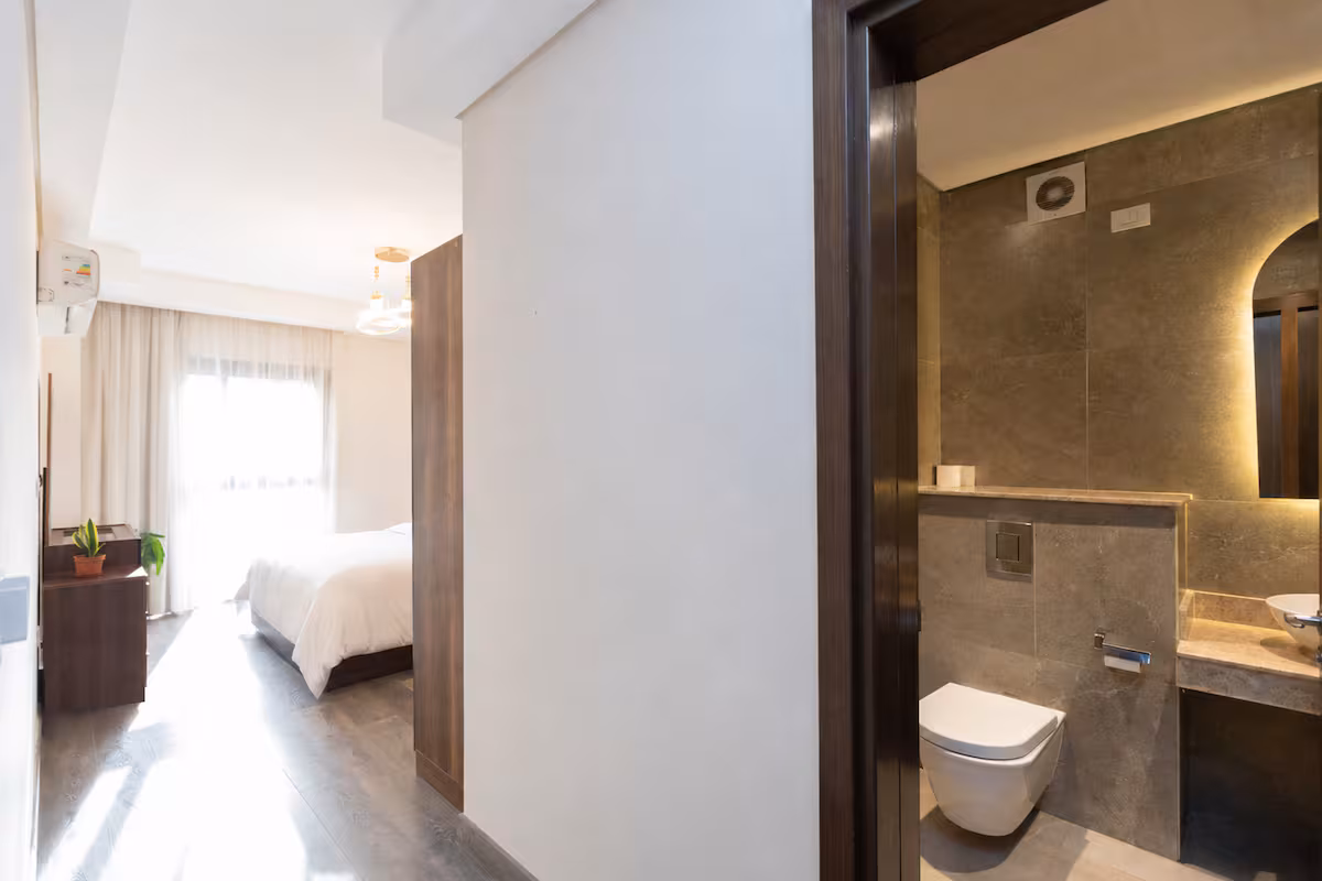 Luxury 3BR Haven Overlooking Green Views -ZED West — Full bathroom 1 in Sheikh Zayed City, Egypt