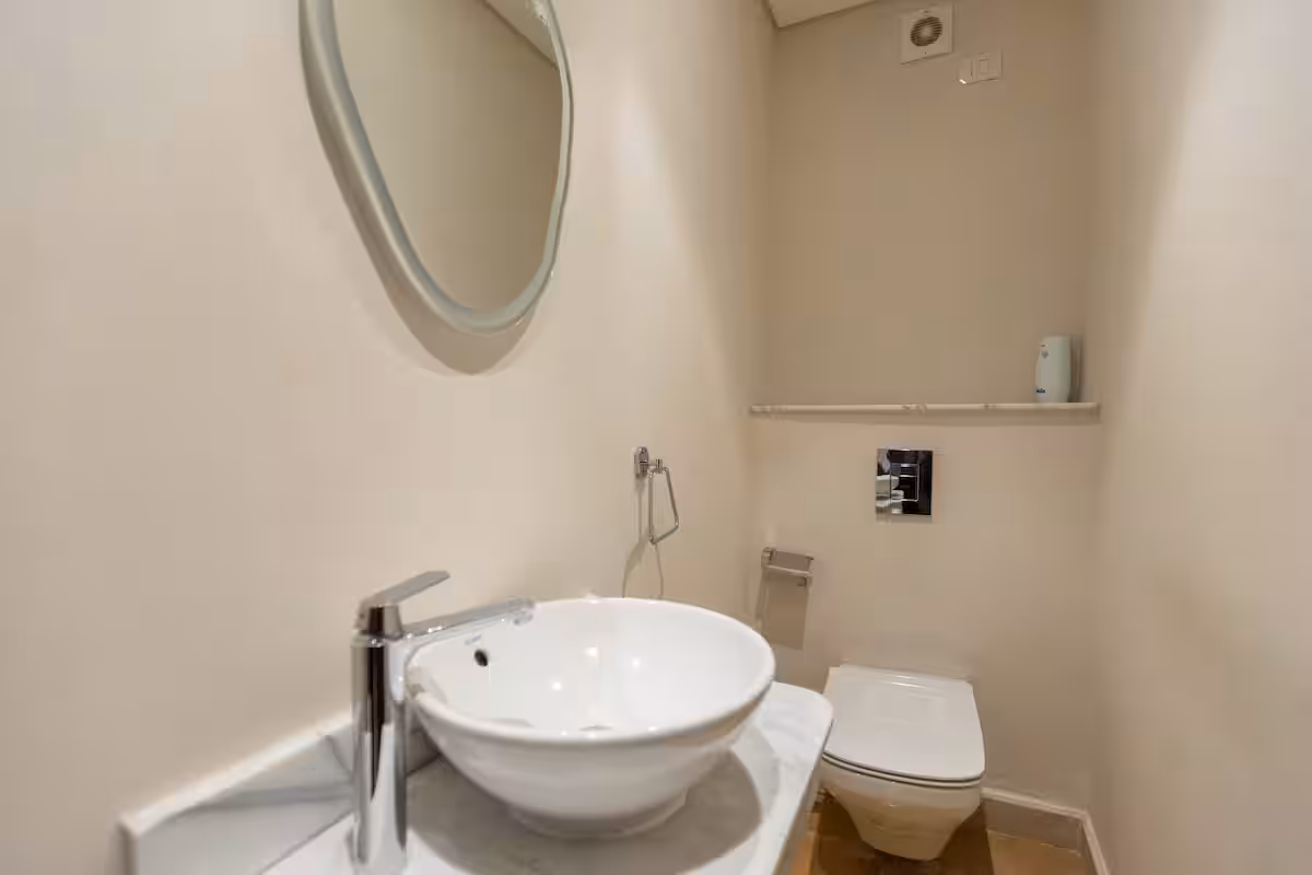 Luxury 3BR Haven Overlooking Green Views -ZED West — Half Bathroom 1 in Sheikh Zayed City, Egypt — photo 2