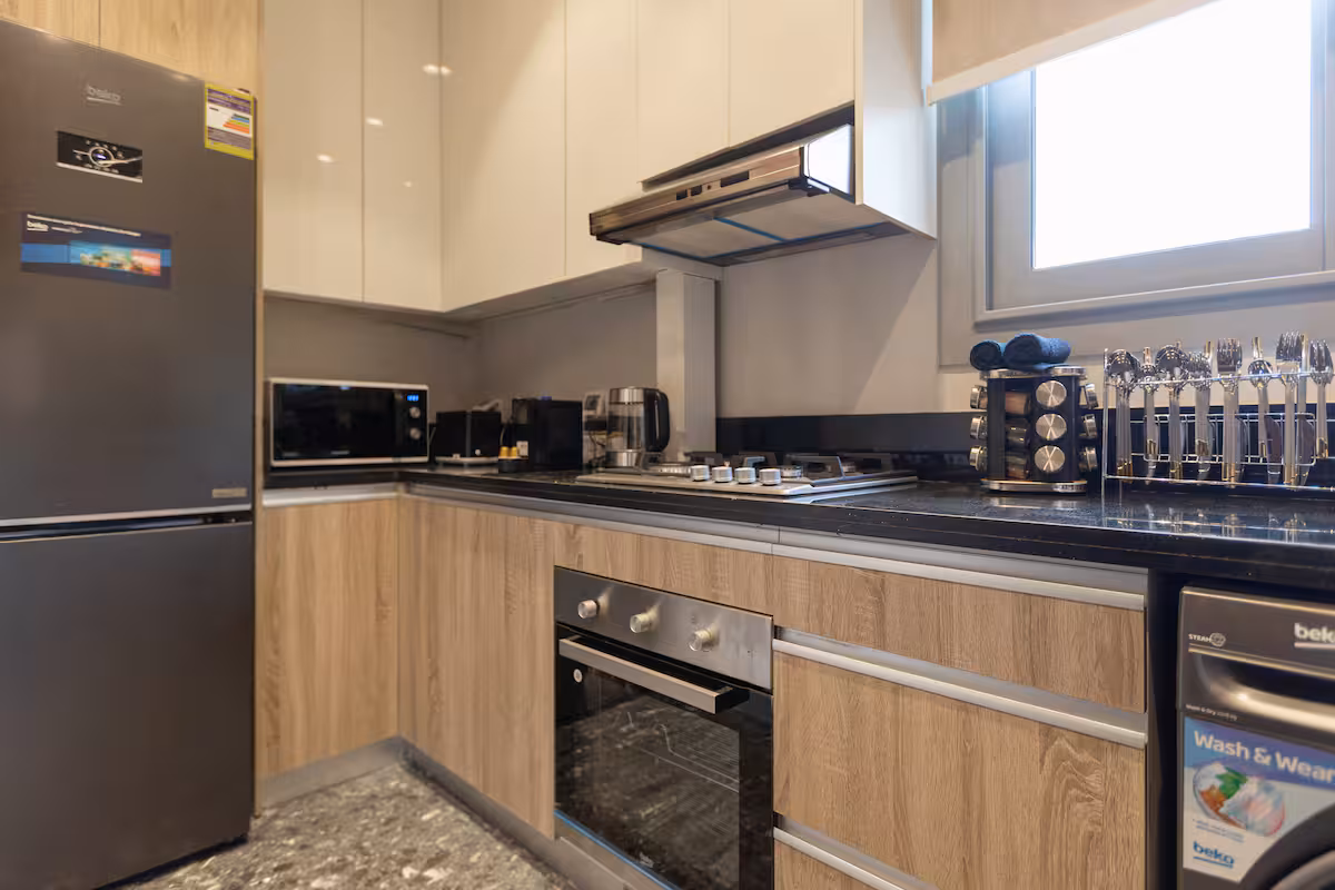 Luxury Pool View Suite at JW Marriott Residences — Full Kitchen in First New Cairo, Egypt