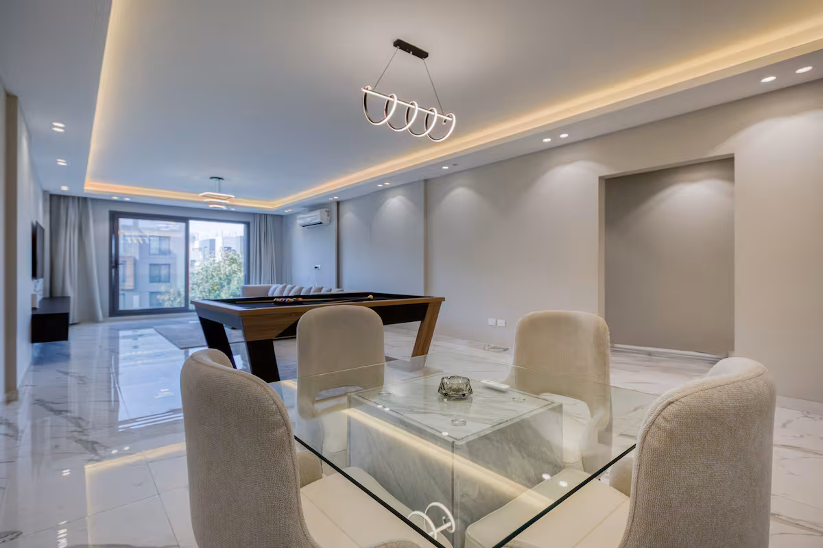 Panoramic Garden & Pool View |3-BR Apt|Silver Palm — Dining Area in First New Cairo, Egypt