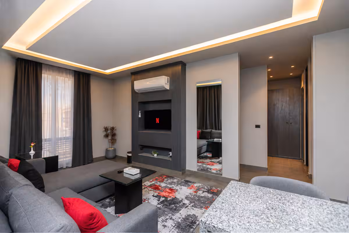 1BR Suite | Maisonette Boutique | Waterway front — Living Room in First New Cairo, Egypt — photo 3