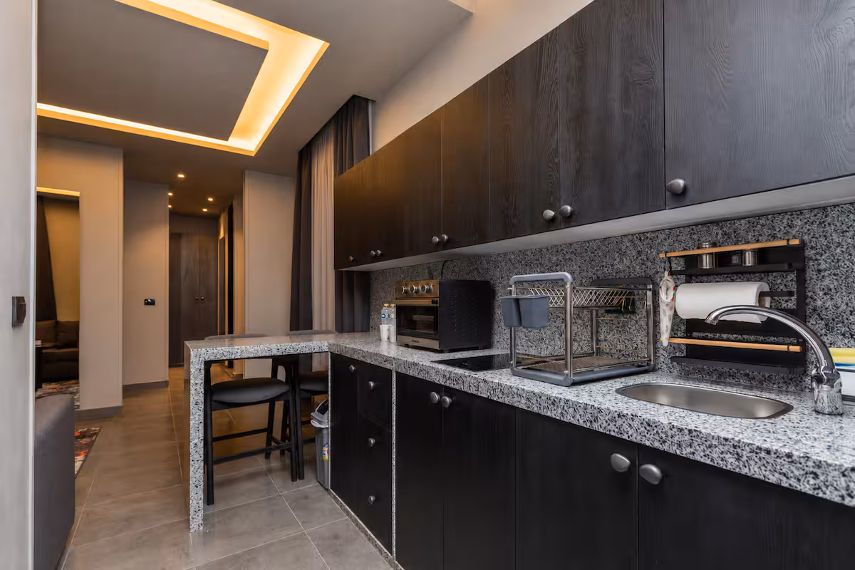 1BR Suite | Maisonette Boutique | Waterway front — Full Kitchen in First New Cairo, Egypt — photo 2