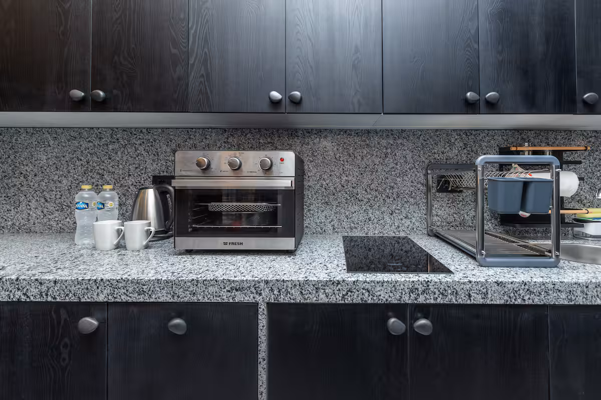 1BR Suite | Maisonette Boutique | Waterway front — Full Kitchen in First New Cairo, Egypt — photo 3
