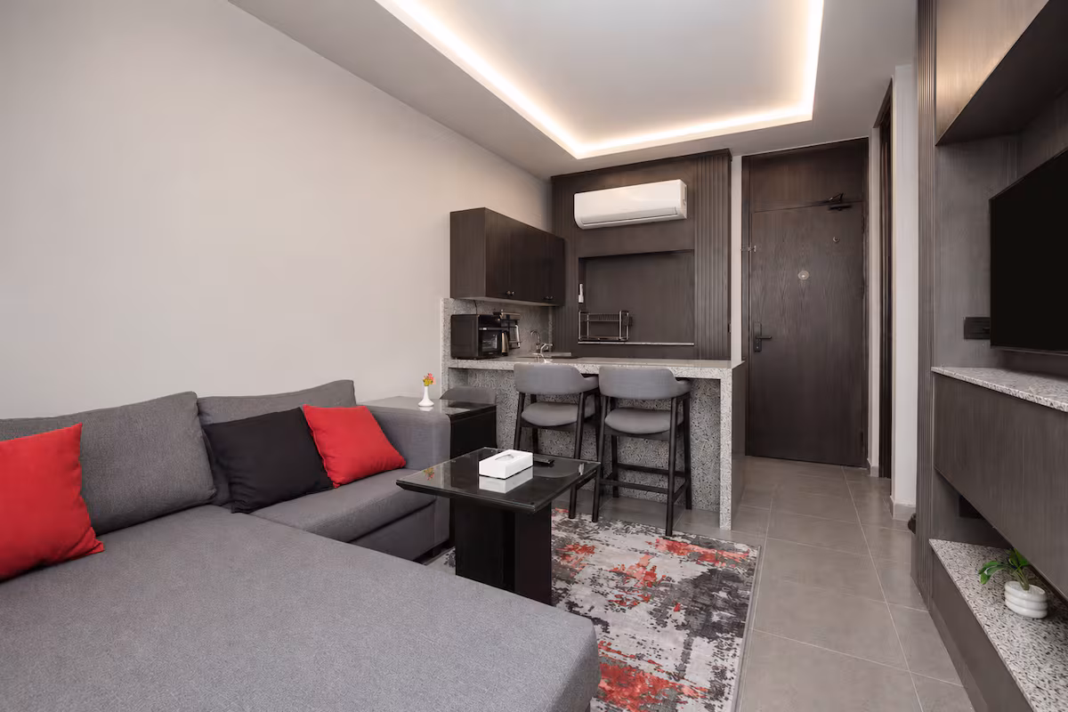 Maisonette | Stunning Waterway View & Balcony — Living Room in First New Cairo, Egypt