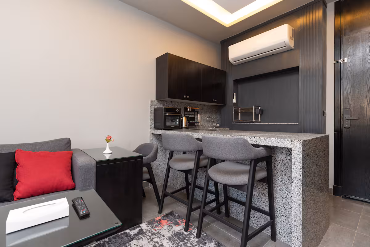 Maisonette | Stunning Waterway View & Balcony — Living Room in First New Cairo, Egypt — photo 3