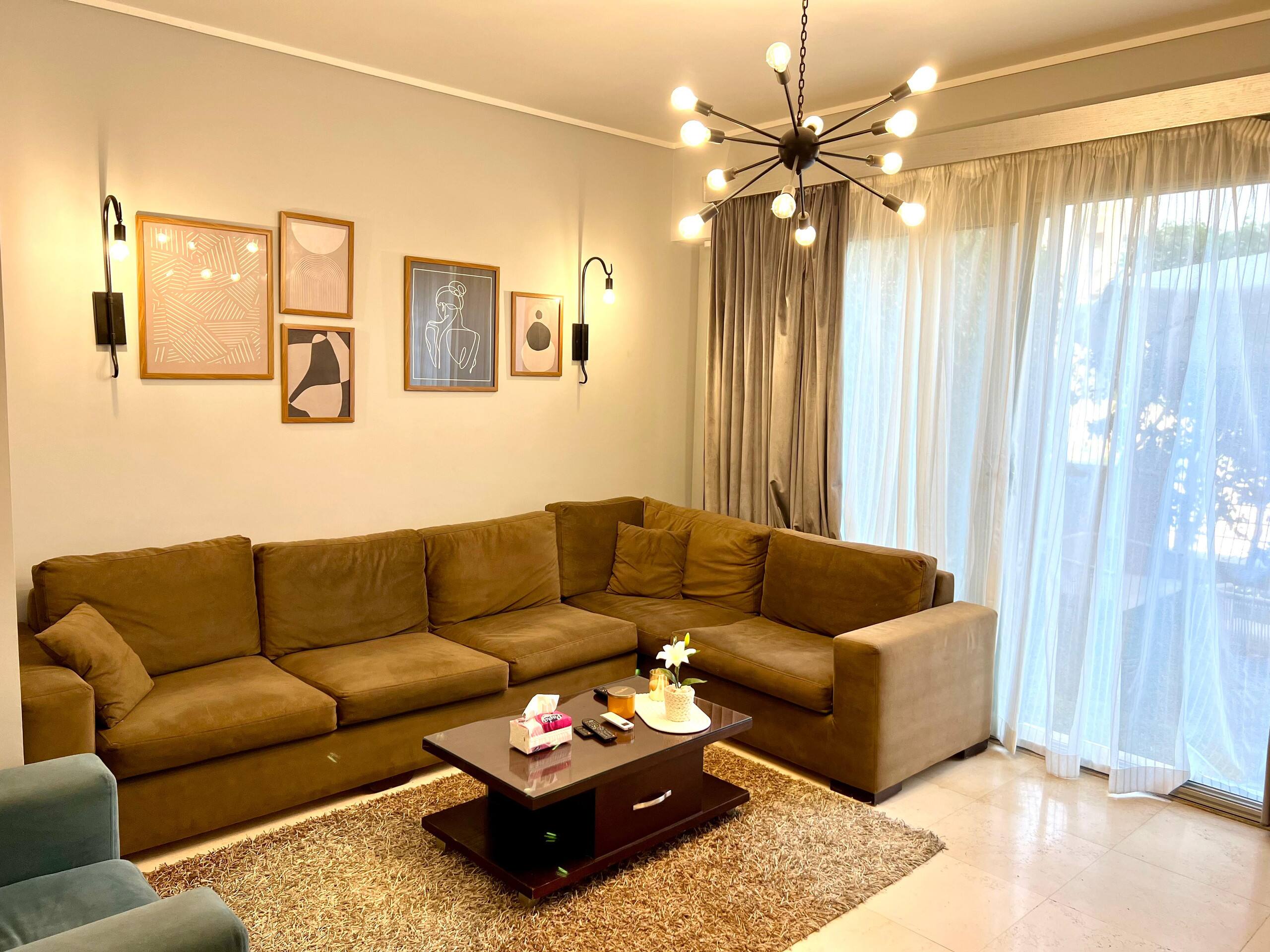 New Cairo Quite 1-bed w/ Garden - Palm Hills *PR* — Living Room in New Cairo, Egypt — photo 2