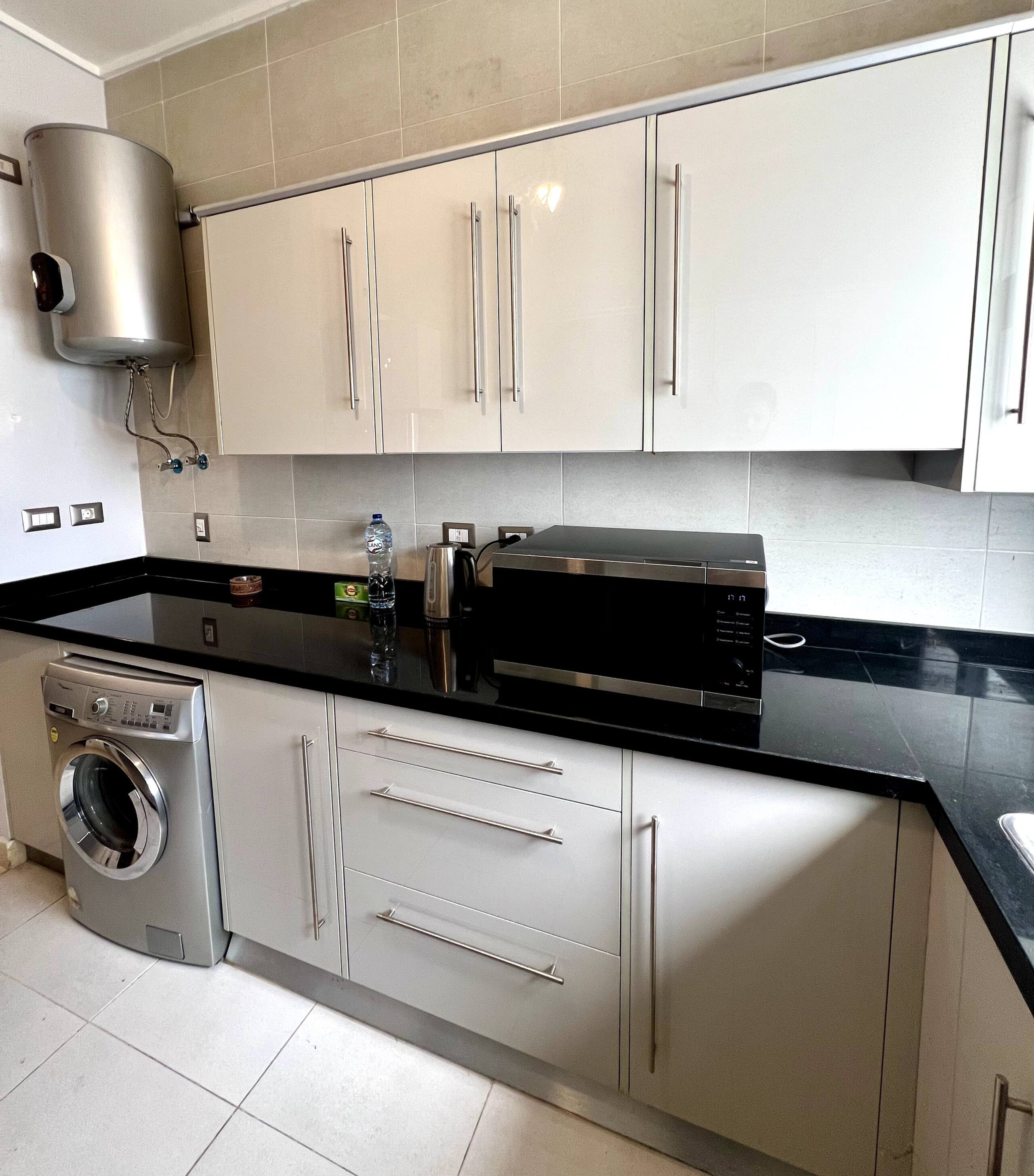 Cozy New Cairo serviced 1-bed — Full Kitchen in First New Cairo, Egypt — photo 2