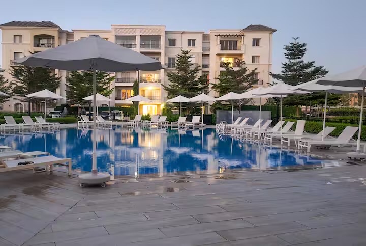 Luxury 3BR with private Garden | Mivida by Emaar — Pool in Cairo, Egypt, Egypt