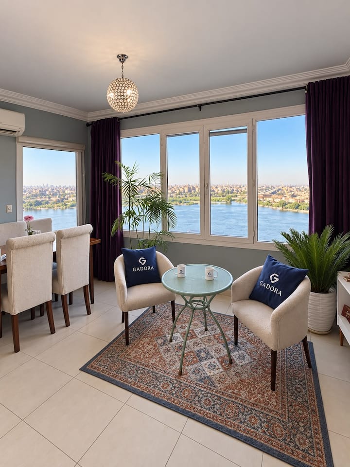 Nile&Pyramid Views|2BR| Art gallery — Living Room in Nile Corniche, Cairo, Egypt