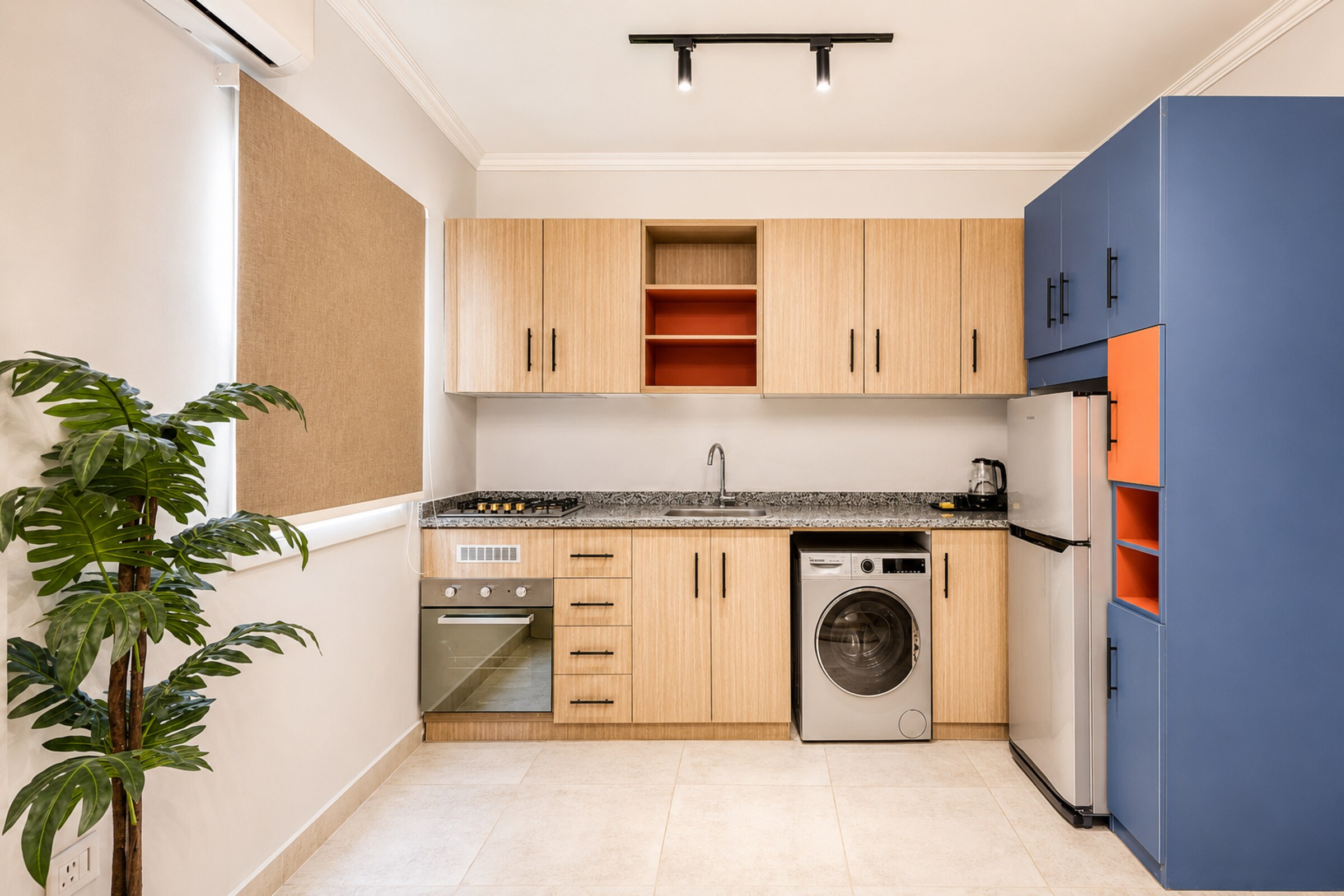 Travelholic Retro Mint 2BR Apartment | Lotus 101 — Full Kitchen in Travelholic Residence near Mivida, Building 54, South Lotus. Apartment 101., Egypt