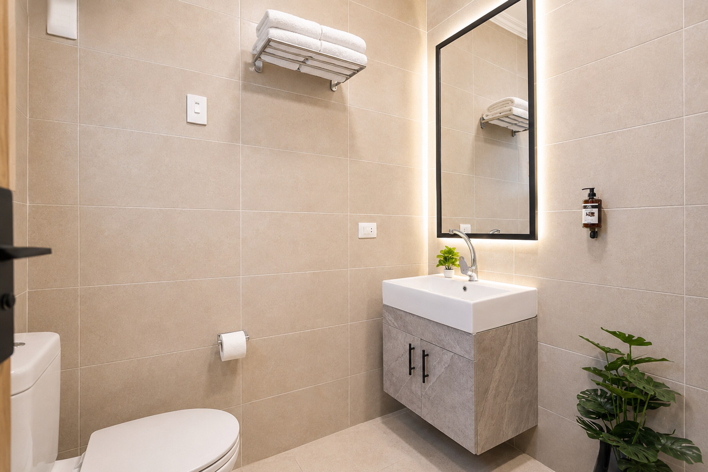 Travelholic Retro Mint 2BR Apartment | Lotus 301 — Full bathroom 1 in Travelholic Residence near Mivida. Unit 301., Egypt — photo 2